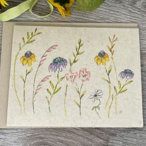 Painting of wildflowers on a biodegradable card